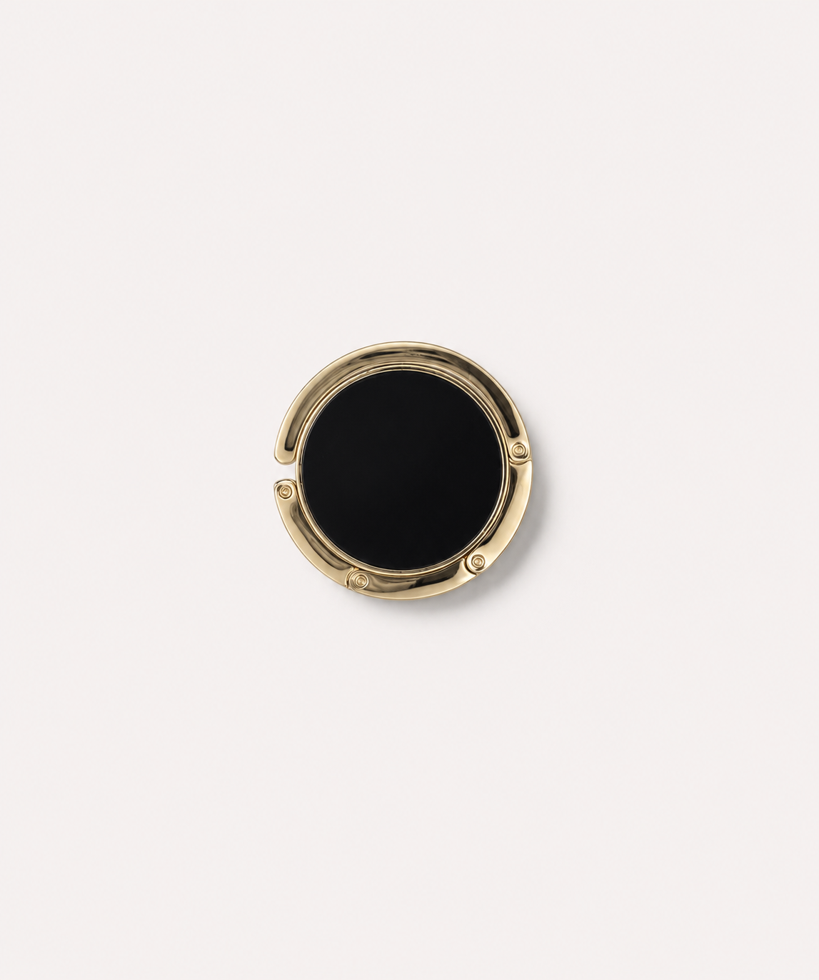 Back view of the Sundays in Paris Le Petite gold purse hook showing the folding hook mechanism